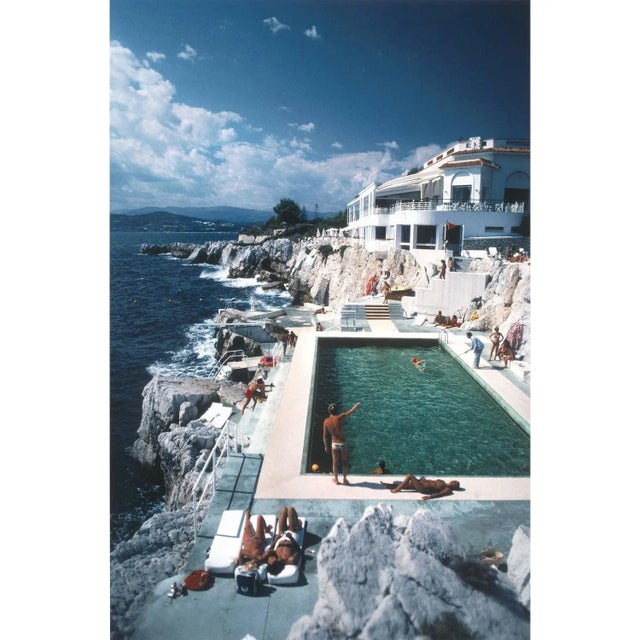 Hotel du Cap Eden print by Slim Aarons This is a new C type print printed from the original negative. It comes with...