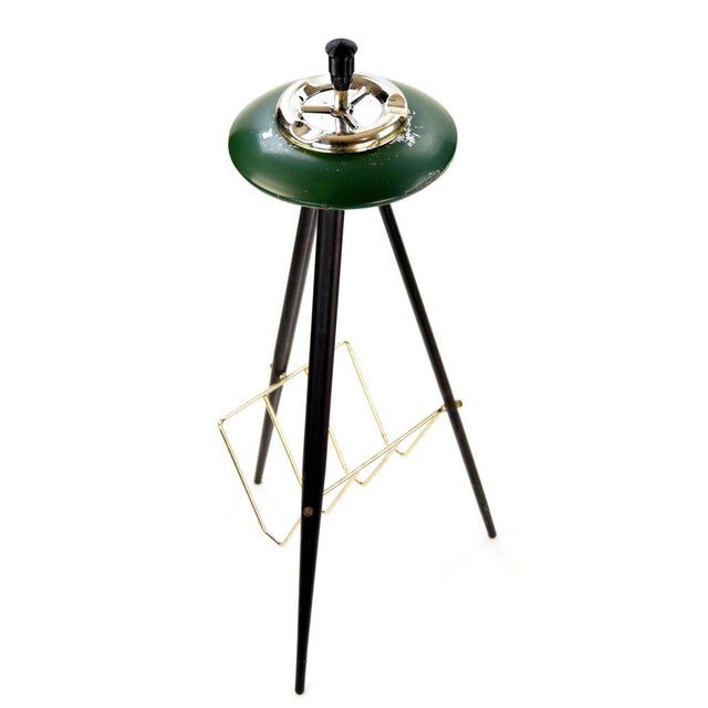 Freestanding ashtray, made in the mid-20th century. This freestanding ashtray features a push-button mechanism that closes...