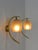 Pair of bell-shaped wall lamps designed by Pietro Chiesa and produced by Fontana Arte with a gilded brass structure and a...