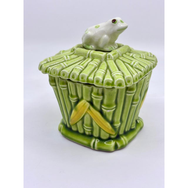 Vintage midcentury green bamboo ceramic jar with frog lid. White and green frog. Great for the bathroom or just a small...