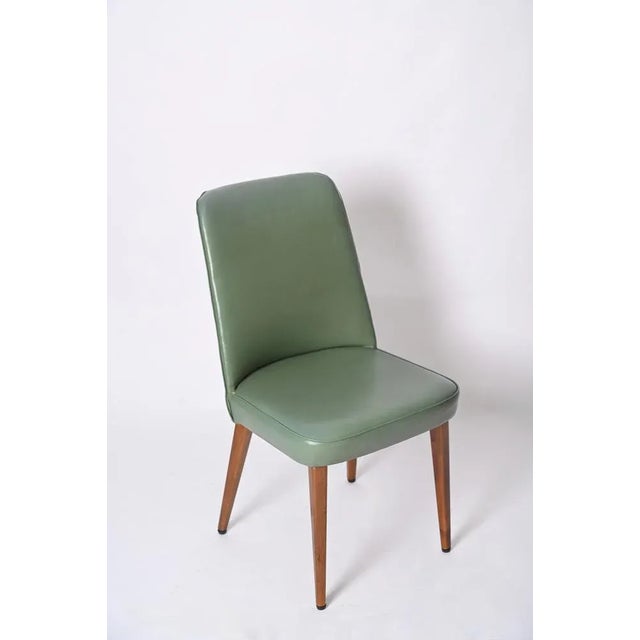 Stunning green sky leather chair by Anonima Castelli Bologna Italy. This beautiful chair was produced in Italy in the...