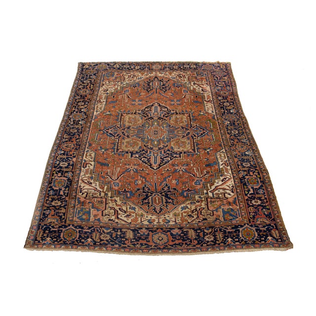 Discover the beauty of this antique Persian Heriz wool rug, showcasing a stunning multicolor medallion design that brings...