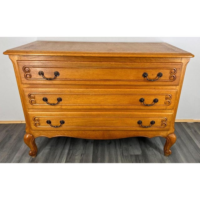 8 The chest of drawers sideboard has three drawers , the drawers are decorated with wonderful carvings, it rests on...