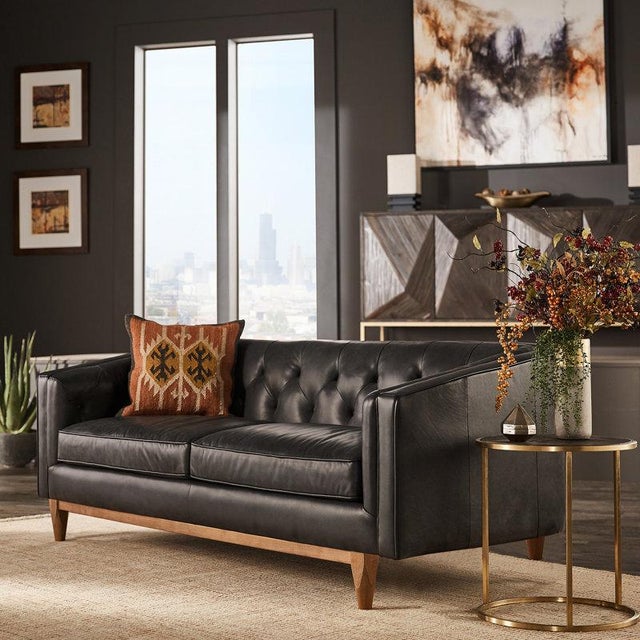 Experience the classic heritage & contemporary clean lines with the Monrowe Leather Loveseat. The Monrowe Leather Loveseat...