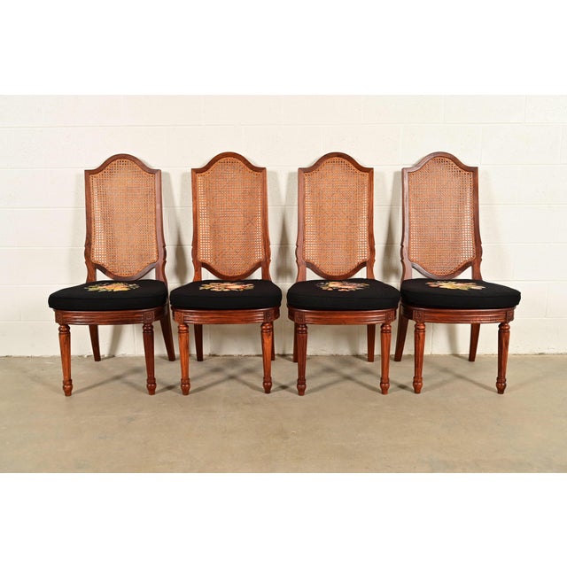 A gorgeous set of four French Regency Louis XVI style dining chairs In the manner of Karges Furniture USA, Circa 1970s...