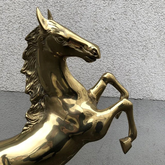 This large solid brass horse combines elegance and craftsmanship excellence. The statue impresses with its dynamic shape...
