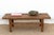 This charming coffee table is a soulful anchor for the curated living space. Handcrafted from solid reclaimed elm, this...