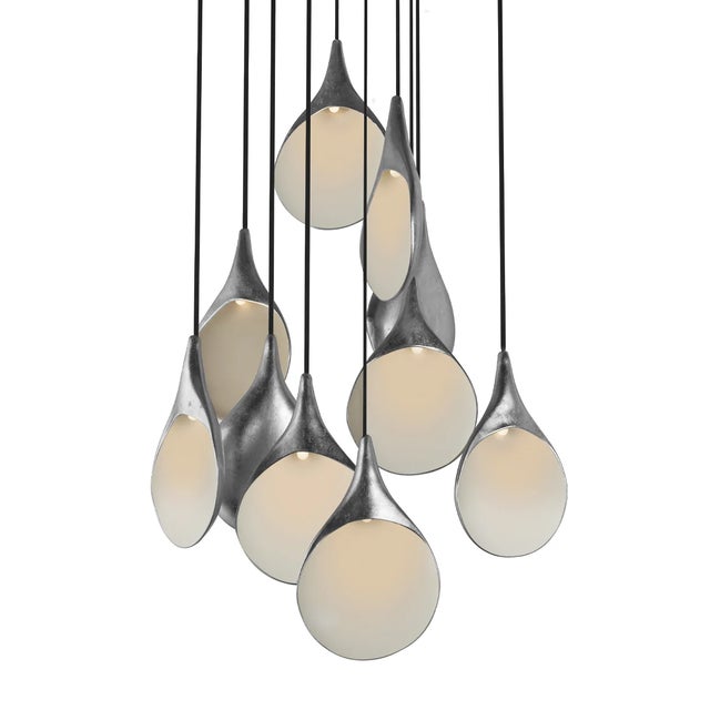 Handcrafted in Italy by the most skilled Italian craftsmen, the Stillabunt 10-Port Chandelier by Oggetti creates a...
