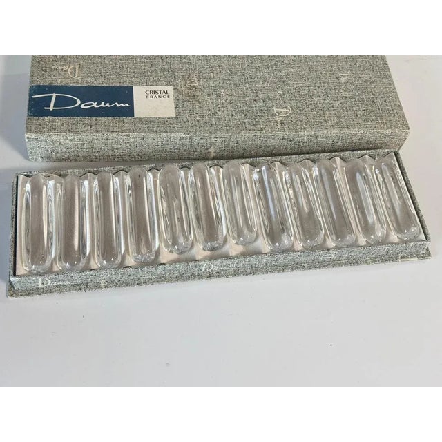 Beautiful set of 12 crystal knife rests from the French brand Daum Nancy. The knife rests have an elegant and simple...