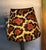 A plug in nightlight handmade with leopard print fabric, bulb included