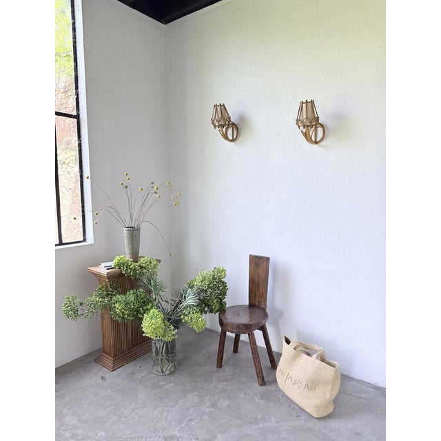 Pair of rattan wall sconces with original ivory fabric shades by louis sognot. reminiscent of the style of french designer...