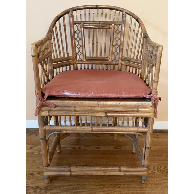 Brighton Pavilion Chair, late 1970's Scorched bamboo and woven rattan seat. Geometric fretwork designs on centered back...