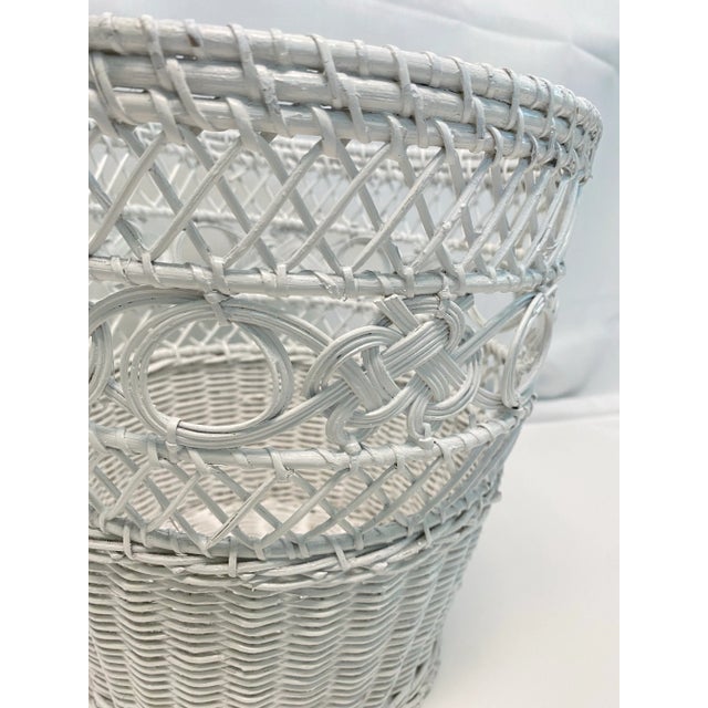 A beautiful fine weave white wicker wastebasket. The detail is beautiful! I actually have two of these. Please see my...