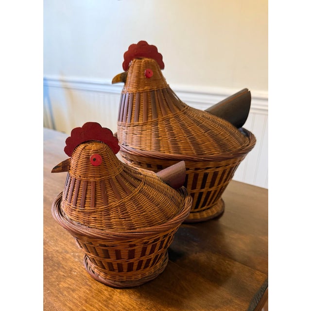 This is a set of two vintage chicken shaped baskets crafted from handwoven wicker with intricate details. Each basket...