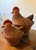 This is a set of two vintage chicken shaped baskets crafted from handwoven wicker with intricate details. Each basket...