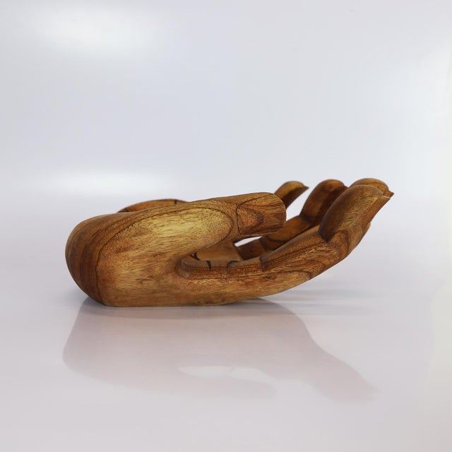 Circa 1940. We offer this Rare Fruit Bowl caved on solid Wood in Hand Form, it can have multiple uses.