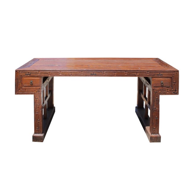 This is a rustic thick raw wood rectangular shape plank table / desk with an opening accent wood base. The surface shows...