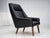 1970s, Danish armchair. Original black artificial leather, teak wood legs, springs in the seat. Original good condition:...