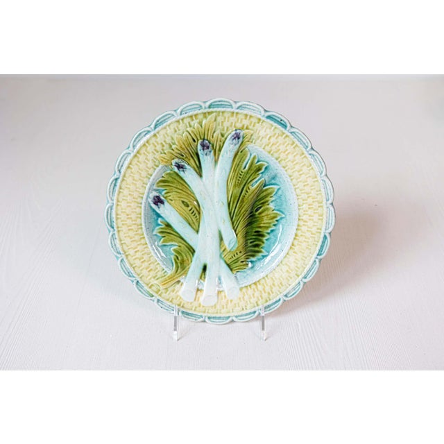 A French Napoleon III period majolica asparagus plate from the mid-19th century, with scalloped edge, turquoise and...