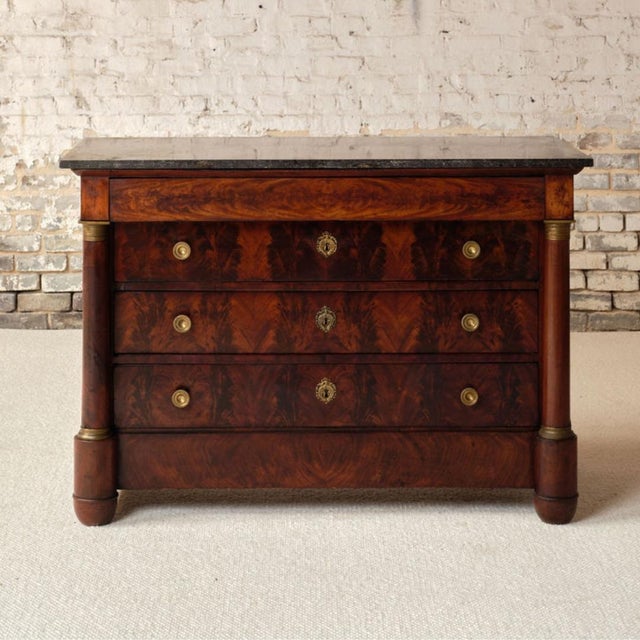 Add classic French elegance to your space with this 19th century French mahogany chest with marble top, a beautifully...
