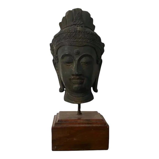 Antique Bronze Bust of Buddha Mounted on a Wood Stand For Sale