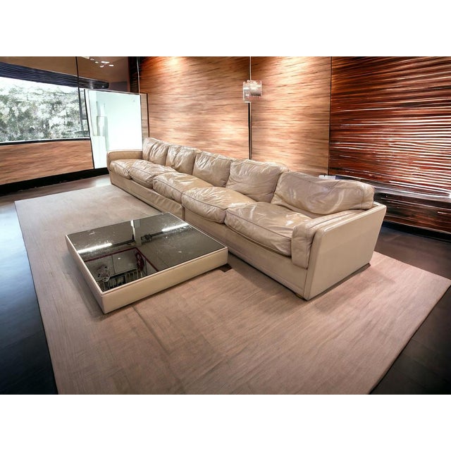 An unusually sized sofa composed of two modules that can be joined or separated: one 220cm and the other 160cm. Socrates...