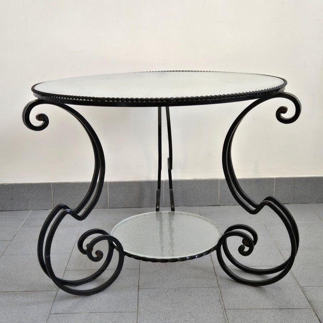 Good overall condition. Some oxidation of the black lacquered metal, particularly under the legs; a small chip and some...
