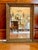 A handsome American mirror, the frame articulated with rows of composition moldings. Composition decoration was made of...