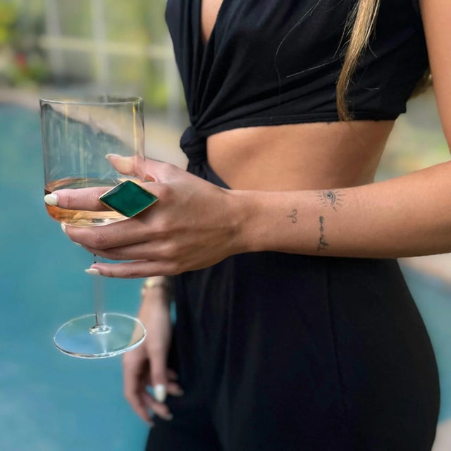 Stylish Green Cat Eye Stone Gold Chunky Ring, a captivating accessory that combines bold design with mystical allure. This...