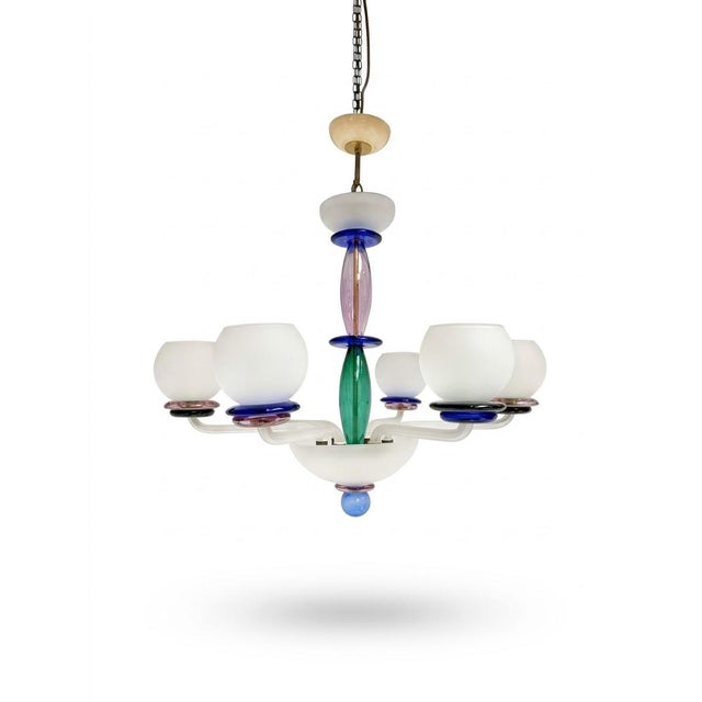 Bring color, character, and timeless Italian elegance into your interior with this Murano glass chandelier! This 1960s...