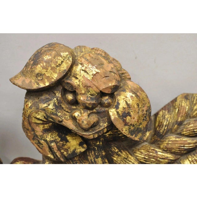 Vintage Chinoiserie Carved Wood Gold Gilt 12" Chinese Foo Dog Figures - A Pair For Sale - Image 4 of 11