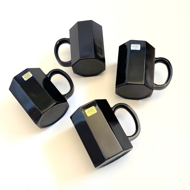 A set of 4 vintage black octagon mugs. Made out of black milk glass. Great postmodern design and geometric shape. Made in...
