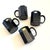 A set of 4 vintage black octagon mugs. Made out of black milk glass. Great postmodern design and geometric shape. Made in...