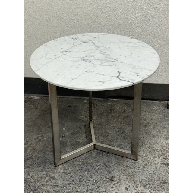 Design Plus Gallery presents the Classic Round End Table from Room & Board. The circular Venatino marble top displays...