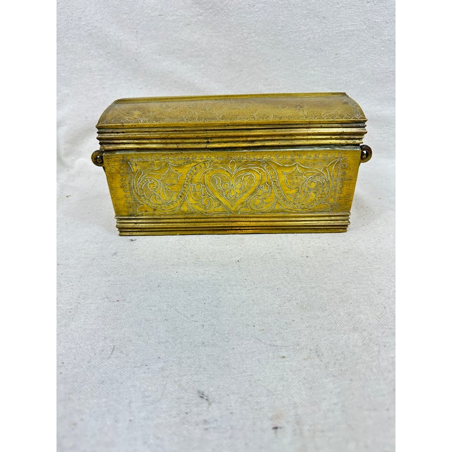 Vintage antique engraved brass box with handles featuring intricate vine and heart design. This is a pre-owned item so...