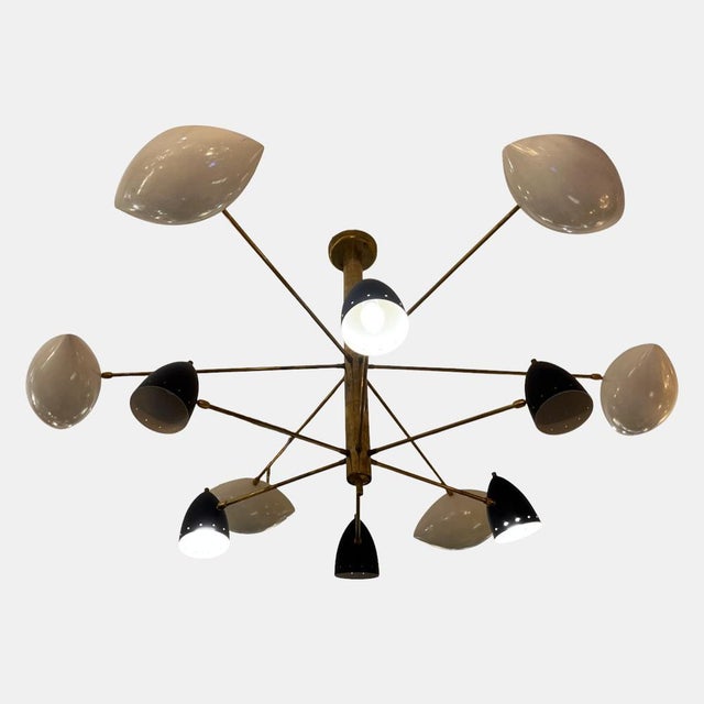 The Stilnovo ceiling lamp boasts an iconic design that blends style and functionality. It features spotlights in two sizes...