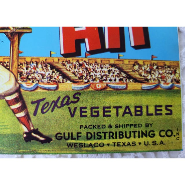 The Safe Hit Texas Vegetables label is a vintage, early-to-mid 20th-century produce crate label used by Gulf Distributing...