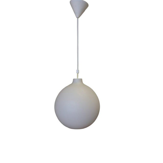 A timeless and elegant Satellite pendant, designed by Vilhelm Wohlert for Louis Poulsen, Denmark. Vilhelm Wohlert designed...
