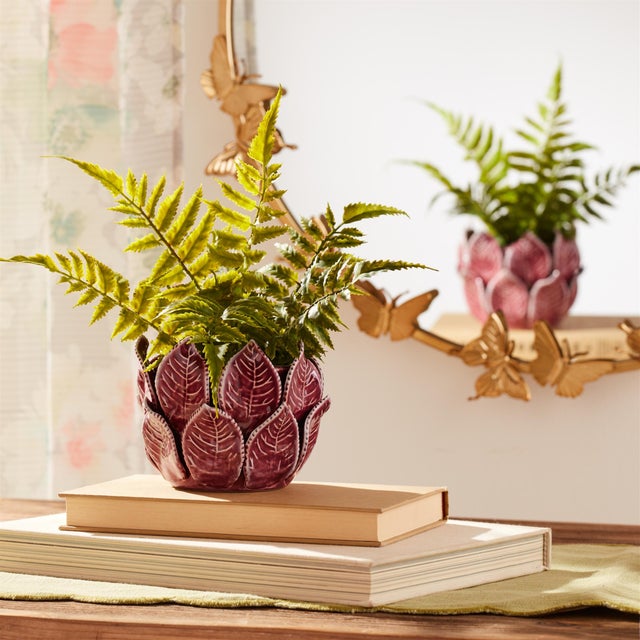 Add a touch of natural elegance to your space with the Stoneware Bud Vase with Leaves Accent. The soft plum purple tones...