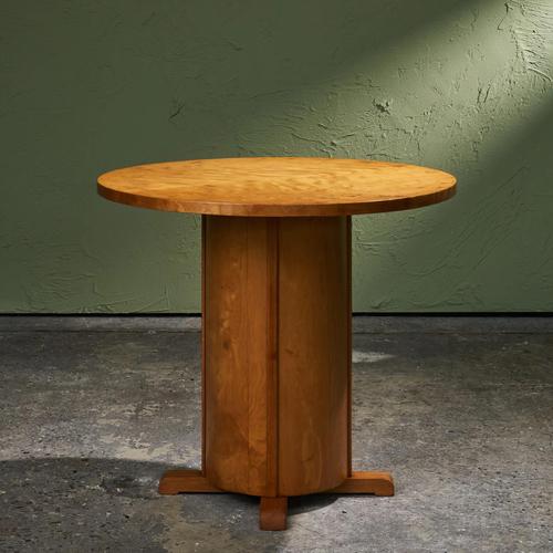 This round Art Deco pedestal side table, made in Belgium in the 1930s, is executed in honey coloured Birch wood and shows...