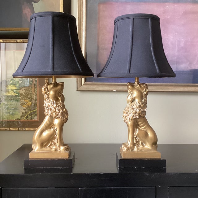 These are known to be by Robert Abbey but they are unmarked. This pair of proud Lions can sit atop a console or buffet...