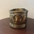Decorative 1980s vintage brass oval cachepot or jardinière featuring an elongated form, applied ring handles and handsome...