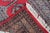 An exceptional Mid-Century Vintage Uzbek Bukhara Style Wool Runner Rug hand-knotted in Uzbekistan. Bukhara-style rugs are...