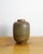 A unique and large swedish mid century "farsta" stoneware urn vase in a decorative brown green glaze designed by wilhelm...