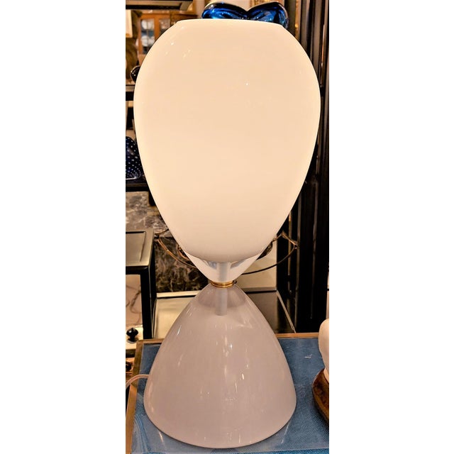 Pair of white hourglass-shaped lamps. European Plug (up to 250V).The wiring of this item may be original and might need...