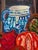 This oil painting is a modernist still life rooted in the early 21st century, drawing clear influence from Paul Cézanne in...
