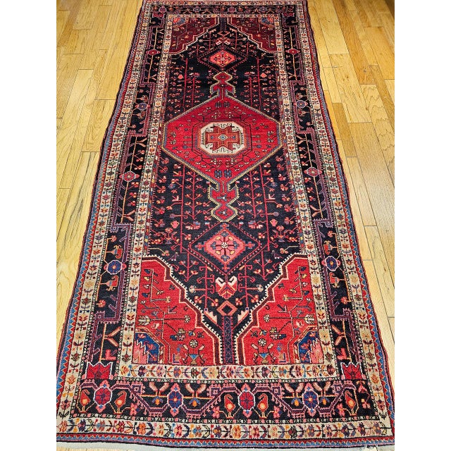 "Vintage Persian Hamadan Village Rug, meticulously handwoven in North West Persia. Hamadan rugs are celebrated for their...