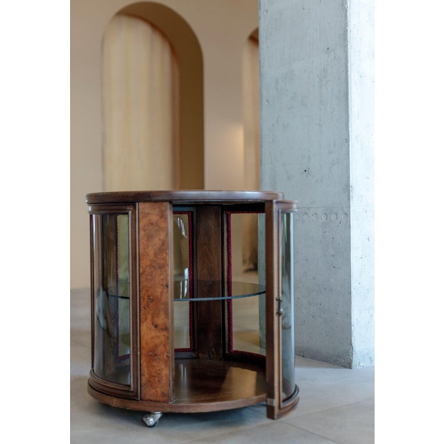 This vintage drinks cabinet is a conversation starter. Italian design crafted from rich burl wood veneer. Adorned with...