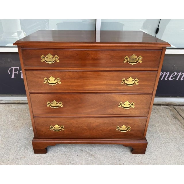 This Henkel Harris Model No. 2440 four-drawer chest is crafted from solid black cherry, with a warm, richly grained finish...