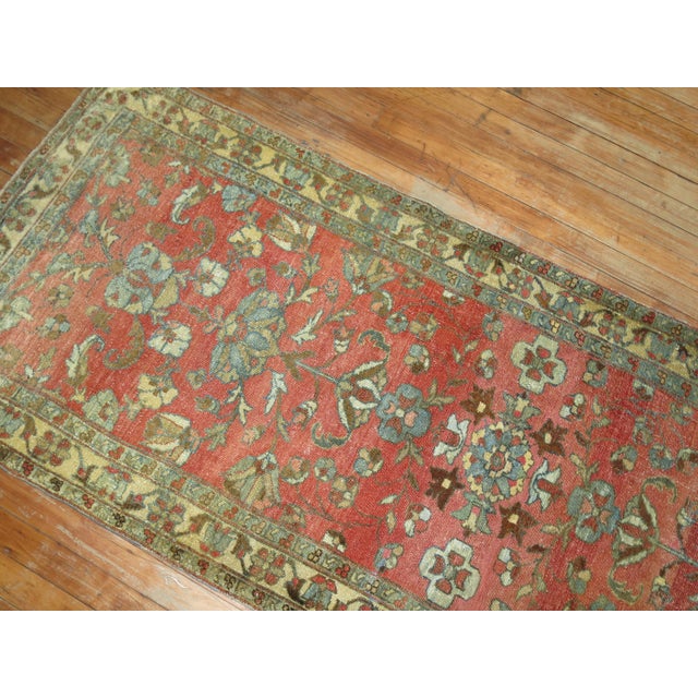 A long and narrow traditional Persian Malayer runner from the early 20th century. Need a long hallway for this! Measures:...